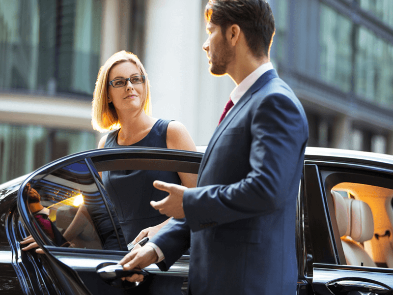 Private chauffeur Arosa, opening the door to client
